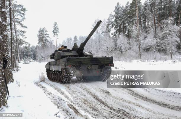 Leopard 2 A5 main battle tank is seen during testing at the Gaiziunai military training area near the Rukla military base, Lithuania on December 15,...