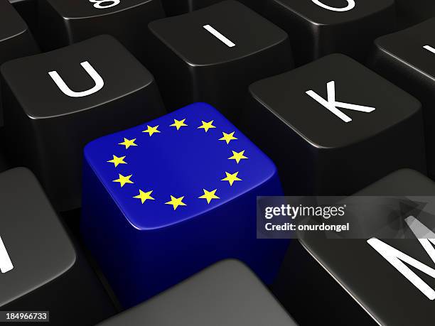 europäische union fahne auf einer tastatur - european union currency stock-fotos und bilder