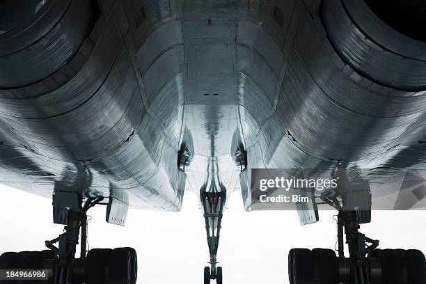 jet airplane, low angle view - överljudsplan bildbanksfoton och bilder