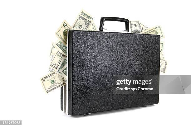 briefcase full of cash - money laundery stockfoto's en -beelden