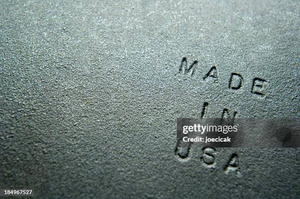 old iron plate embossed with "made in usa" - cast iron stock pictures, royalty-free photos & images