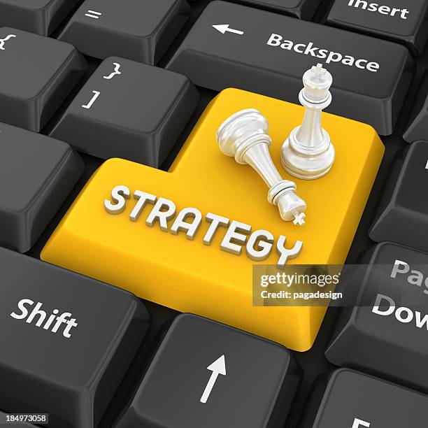 yellow strategy keyboard key with two chess pieces - chess icon stock pictures, royalty-free photos & images