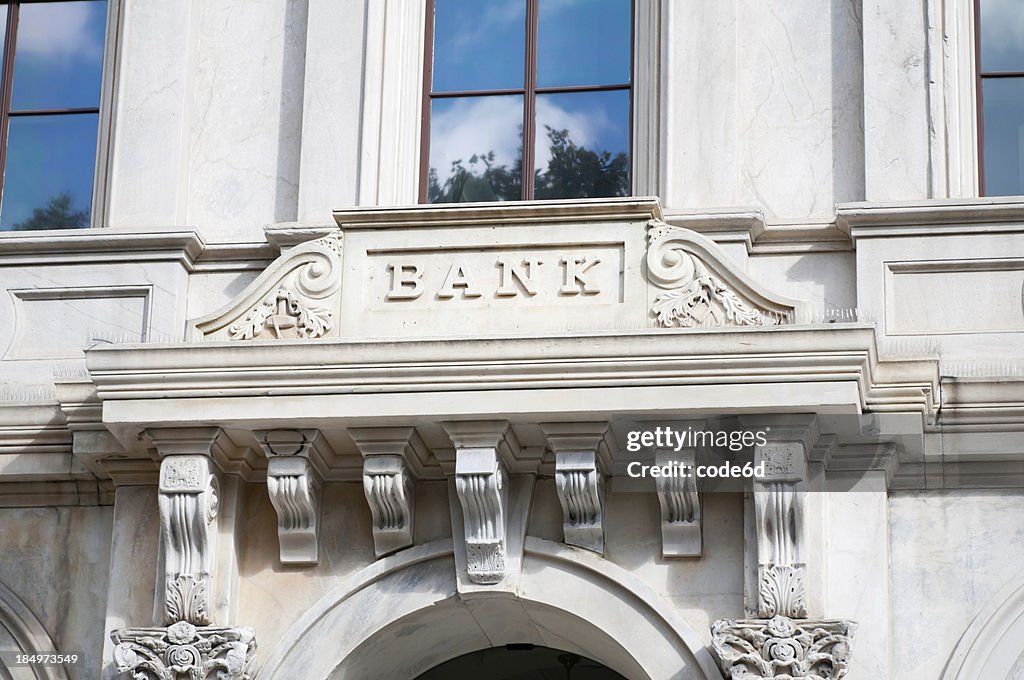 Bank sign on marble facade
