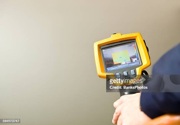 infrared thermal imaging camera for home energy audit - infrared stock pictures, royalty-free photos & images