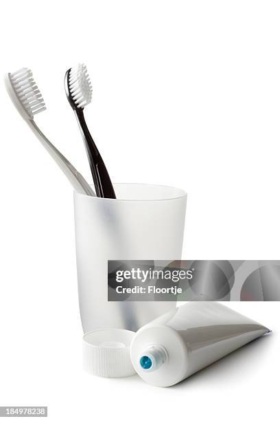 bath: toothbrushes and toothpaste isolated on white background - bath isolated stock pictures, royalty-free photos & images