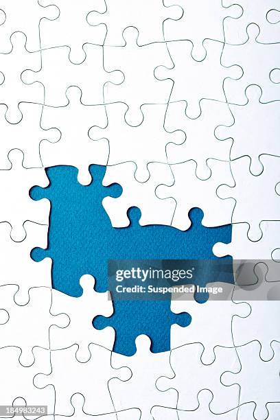 missing pieces - missing jigsaw piece stock pictures, royalty-free photos & images