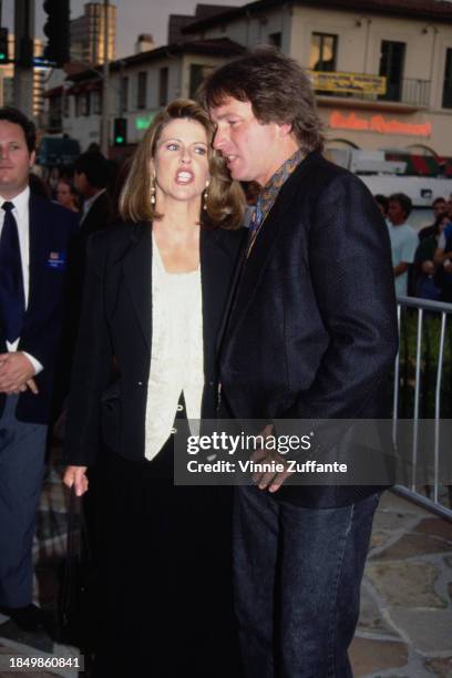 American actress Pam Dawber and American actor John Ritter attend the Westwood premiere of 'Stay Tuned', held at the Mann Village Theatre in the...