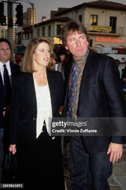 American actress Pam Dawber and American actor John Ritter attend the Westwood premiere of 'Stay Tuned', held at the Mann Village Theatre in the...