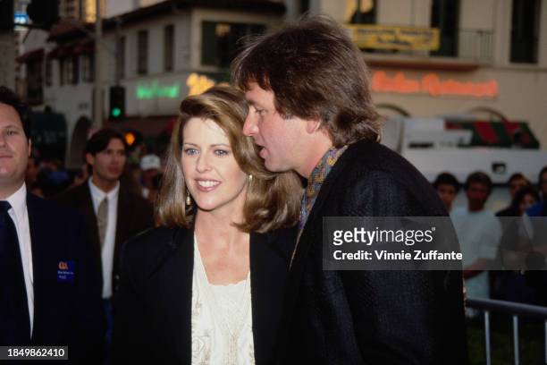 American actress Pam Dawber and American actor John Ritter attend the Westwood premiere of 'Stay Tuned', held at the Mann Village Theatre in the...