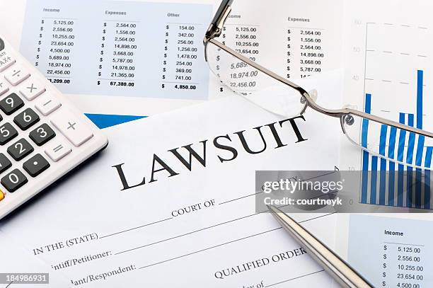 lawsuit form an a desk - lawsuit stock pictures, royalty-free photos & images