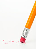 Pink eraser of a pencil against white surface and background