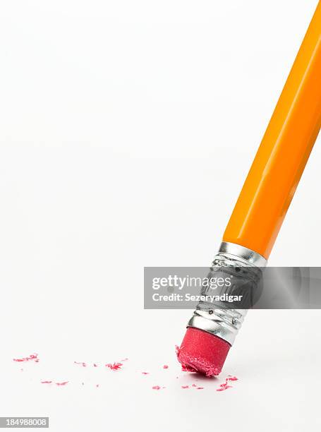 pink eraser of a pencil against white surface and background - yellow pencil stock pictures, royalty-free photos & images