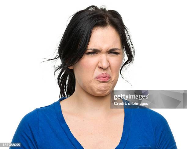 disgusted woman - grimacing stock pictures, royalty-free photos & images