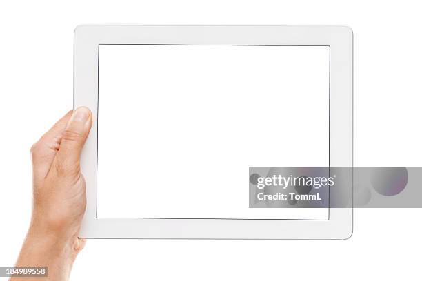 hand holding a digital tablet with empty display - man hand ipad stock pictures, royalty-free photos & images