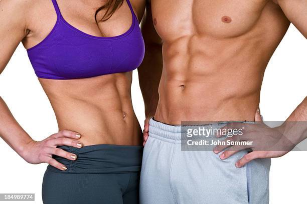 male and female waist for fitness concept - muscular build stock pictures, royalty-free photos & images