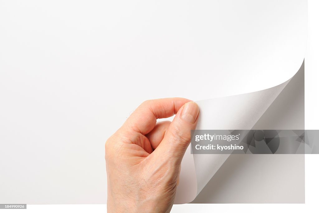 Close-up shot of opening a blank page by the hand