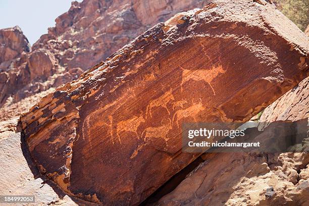 ancient rock art in namibia, south africa - namibia stock pictures, royalty-free photos & images