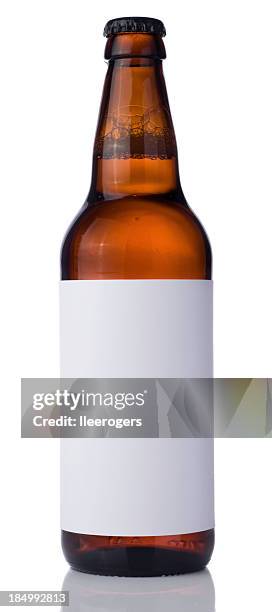 bottle of beer with blank label on a white background - bierfles stockfoto's en -beelden