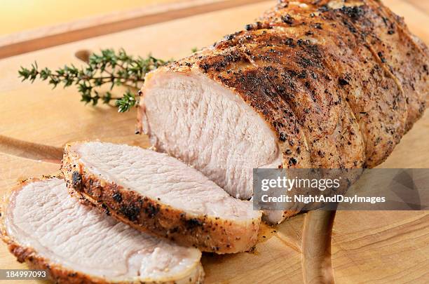 roasted pork tenderloin - roasted stockfoto's en -beelden