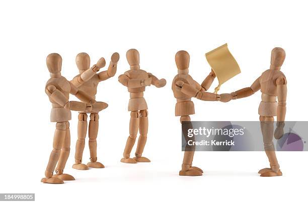 wooden mannequin congratulate with certificate - artists model stock pictures, royalty-free photos & images