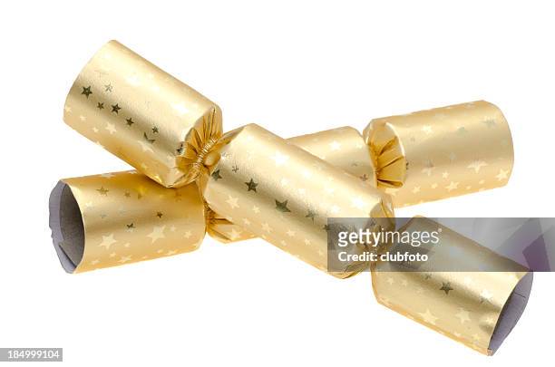 two gold christmas crackers - 聖誕拉炮 個照片及圖片檔
