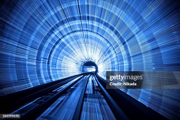 light tunnel speed - neon tunnel stock pictures, royalty-free photos & images