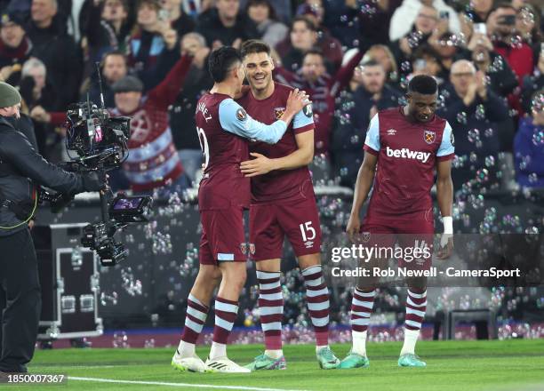 West Ham United's Edson Alvarez celebrates scoring his side's second goal with Konstantinos Mavropanos and Mohammed Kudus during the Europa League...