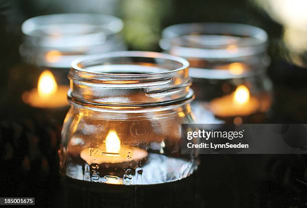 evening glow - brown glass candle stock pictures, royalty-free photos & images