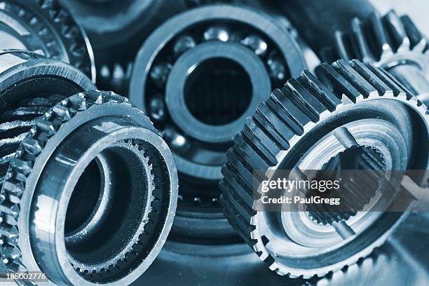 gears and bearings. - bearing stock pictures, royalty-free photos & images