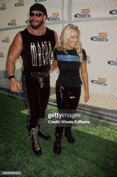 American wrestlers 'Macho Man' Randy Savage and Stephanie Bellars attending the Nickelodeon Kids' Choice Awards at the Pauley Pavilion in Los...