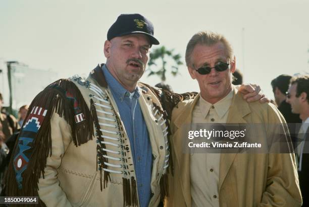 Governor Jesse Ventura, a former WWE wrestler, and actor Nick Nolte attending the Independent Spirit Awards in Santa Monica, March 20th 1999.