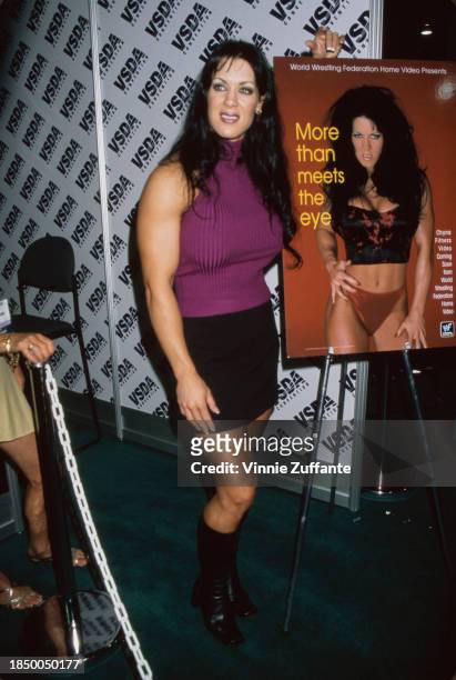 American wrestler Chyna promoting her fitness video 'More Than Meets the Eye' at the Video Software Dealers Association convention in Las Vegas, July...
