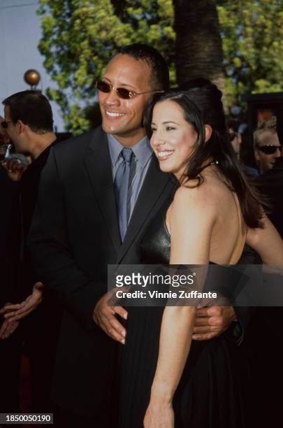 American wrestler and actor Dwayne 'The Rock' Johnson and his wife Dany attending the premiere of 'The Mummy Returns' at the Universal Amphitheater,...