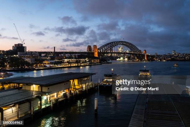 twilight over sydney waterfront in australia - ferry terminal stock pictures, royalty-free photos & images