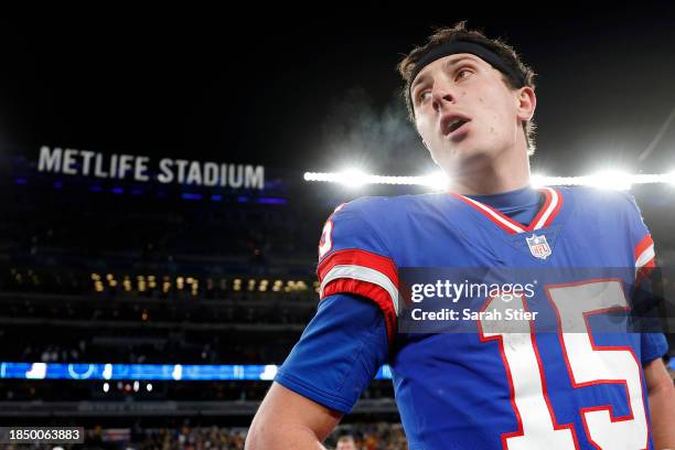 Tommy DeVito of the New York Giants celebrates after defeating the Green Bay Packers in the game at MetLife Stadium on December 11, 2023 in East...