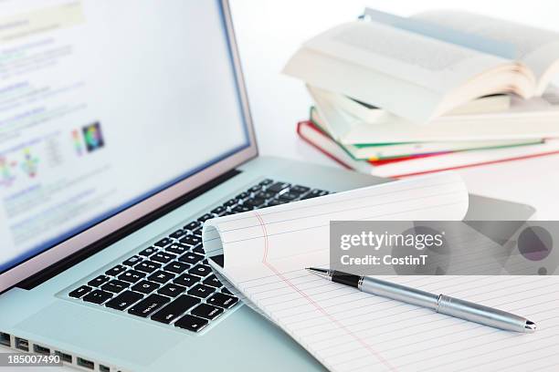 computer, books, notepad - general financial stock pictures, royalty-free photos & images