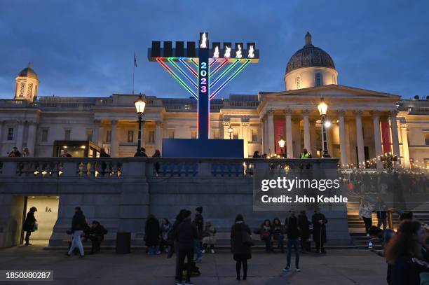 Giant menorah is lit up for Hanukkah, the Jewish festival of lights in Trafalgar Square on December 11, 2023 in London, United Kingdom.