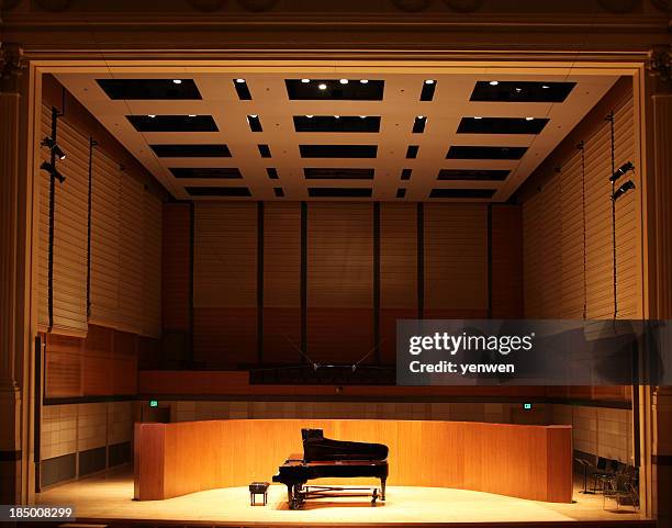 grand piano on stage - concert hall stock pictures, royalty-free photos & images