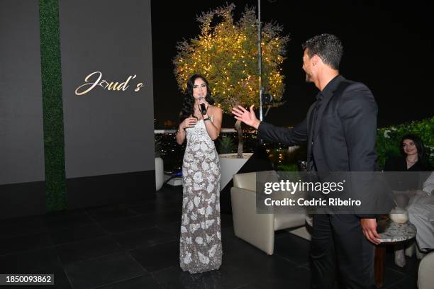 Caroline Joude and Jan luis Castellanos speak to guest's at Joud's Cocktail Launch event at Jumeirah Beach Hotel on November 18, 2023 in Dubai,...