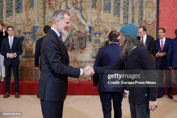 King Felipe VI greets those attending the meeting of the Board of Trustees of the Fundacion Pro Real Academia Española and subsequent presentation of...