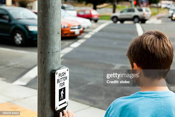 child at pedestrian crossing - walk dont walk signal stock pictures, royalty-free photos & images