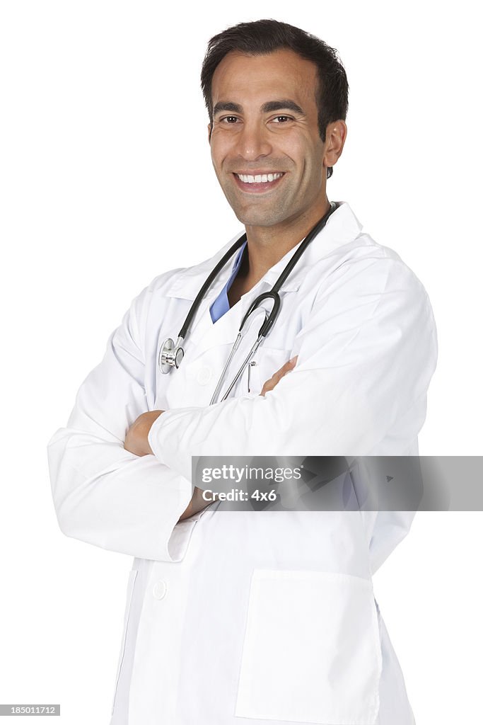 Male doctor standing with his arms crossed