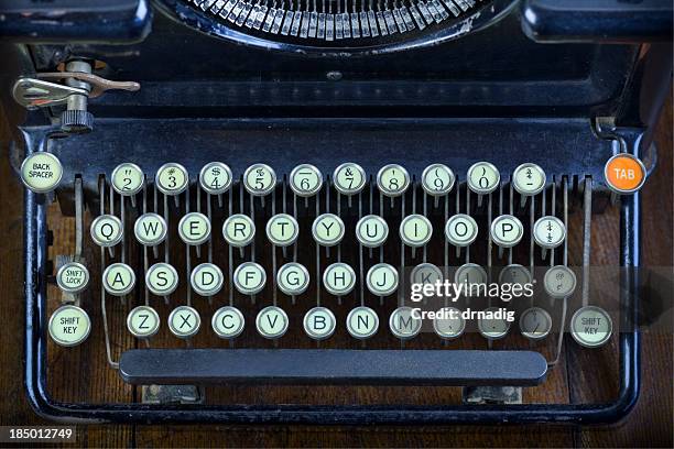 antique typewriter keyboard - j stock pictures, royalty-free photos & images