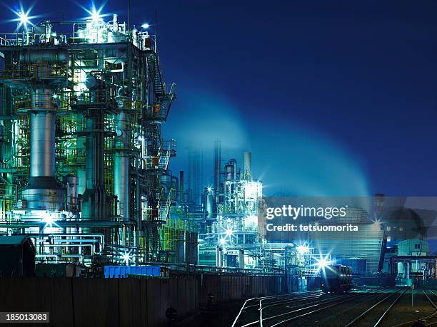 chemical plant lights at night - kawasaki stockfoto's en -beelden