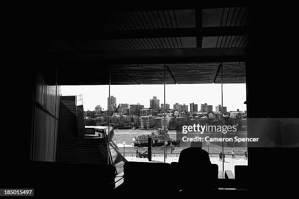 Staff member relaxes in the green room looking out at Sydney Harbour from inside the Sydney Opera House on September 20, 2013 in Sydney, Australia....