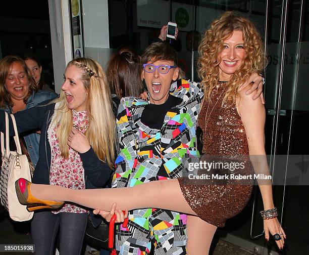 Johnny Robinson and Melanie Masson leaving the Riverside studios after filming Celebrity Juice on October 16, 2013 in London, England.