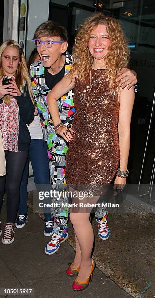 Johnny Robinson and Melanie Masson leaving the Riverside studios after filming Celebrity Juice on October 16, 2013 in London, England.