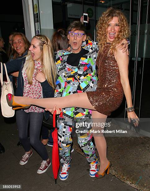 Johnny Robinson and Melanie Masson leaving the Riverside studios after filming Celebrity Juice on October 16, 2013 in London, England.