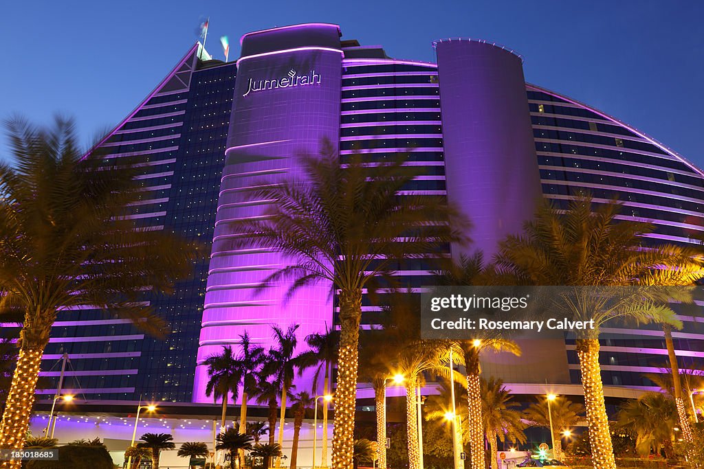 Jumeirah Beach Hotel at dusk, purple floodlighting