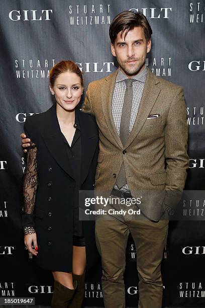 Olivia Palermo and Johannes Huebl attend as Gilt And Stuart Weitzman celebrate the 5050 Boot 20th anniversary on October 16, 2013 in New York City.